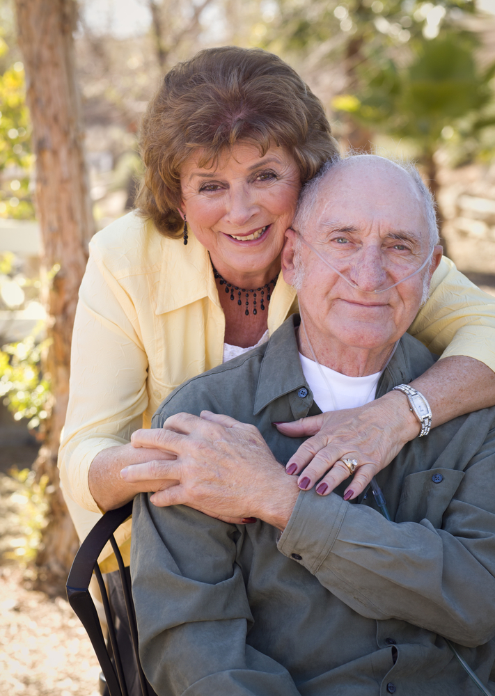 senior outside using oxygen